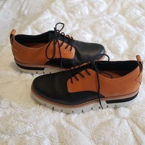 CAT BROWN-BLACK LOAFERS...SIZE:7 1/2 W GREAT CONDITION